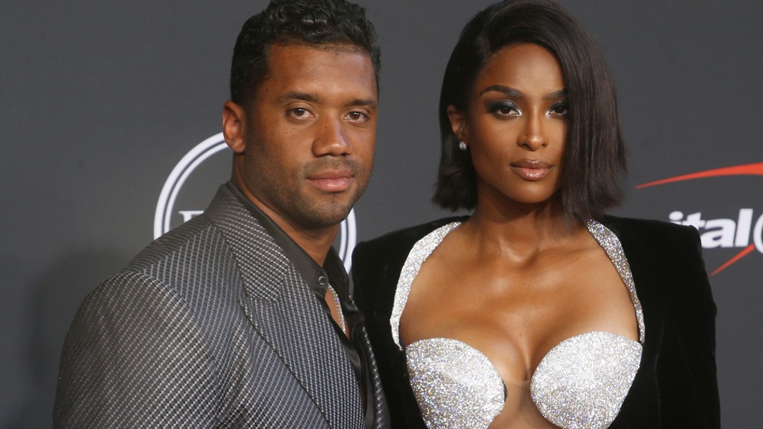 Russell Wilson Shares Photo of Ciara Cradling Baby Amora